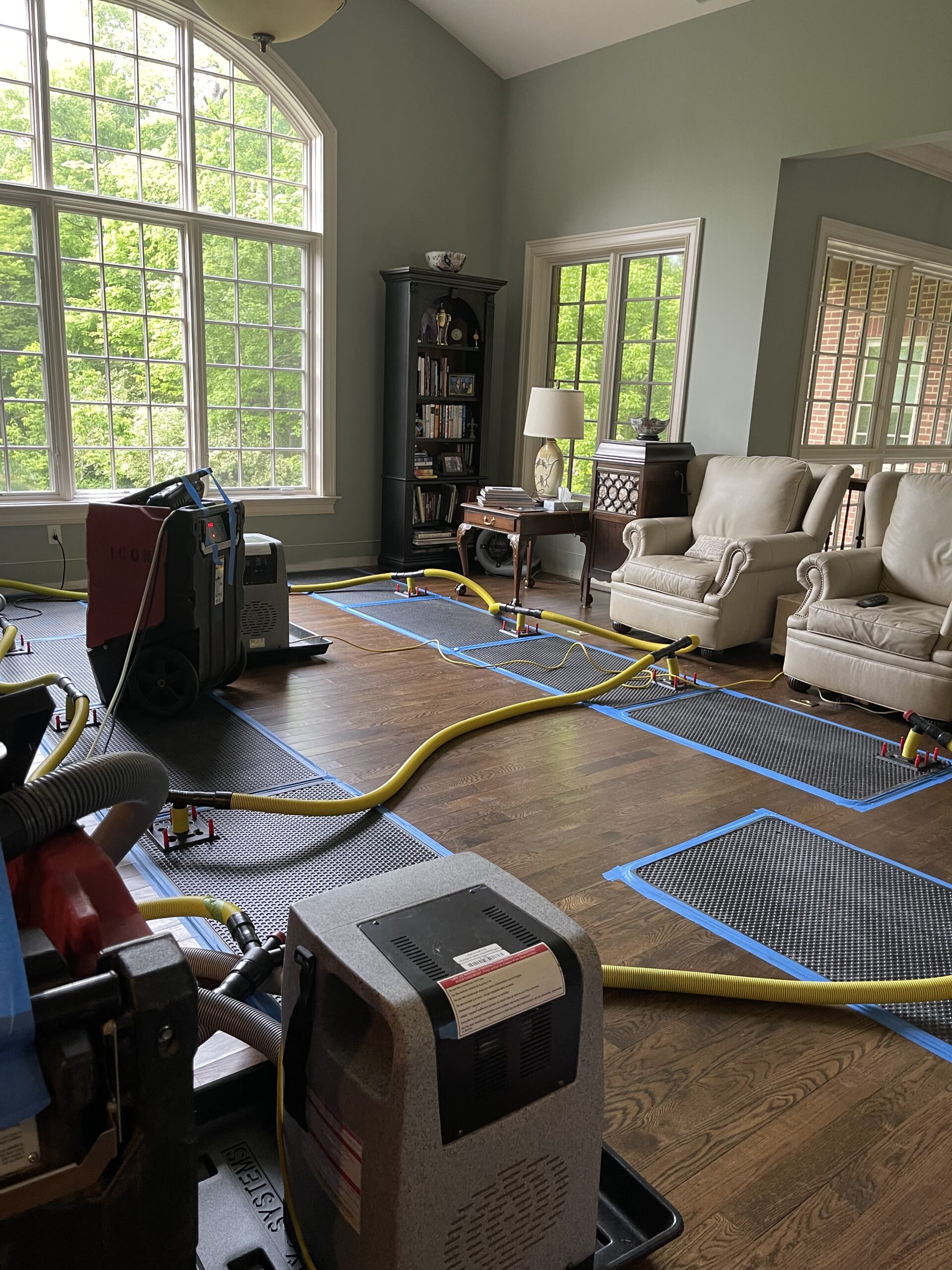 Drying fans and dehumidifier in a finished basement