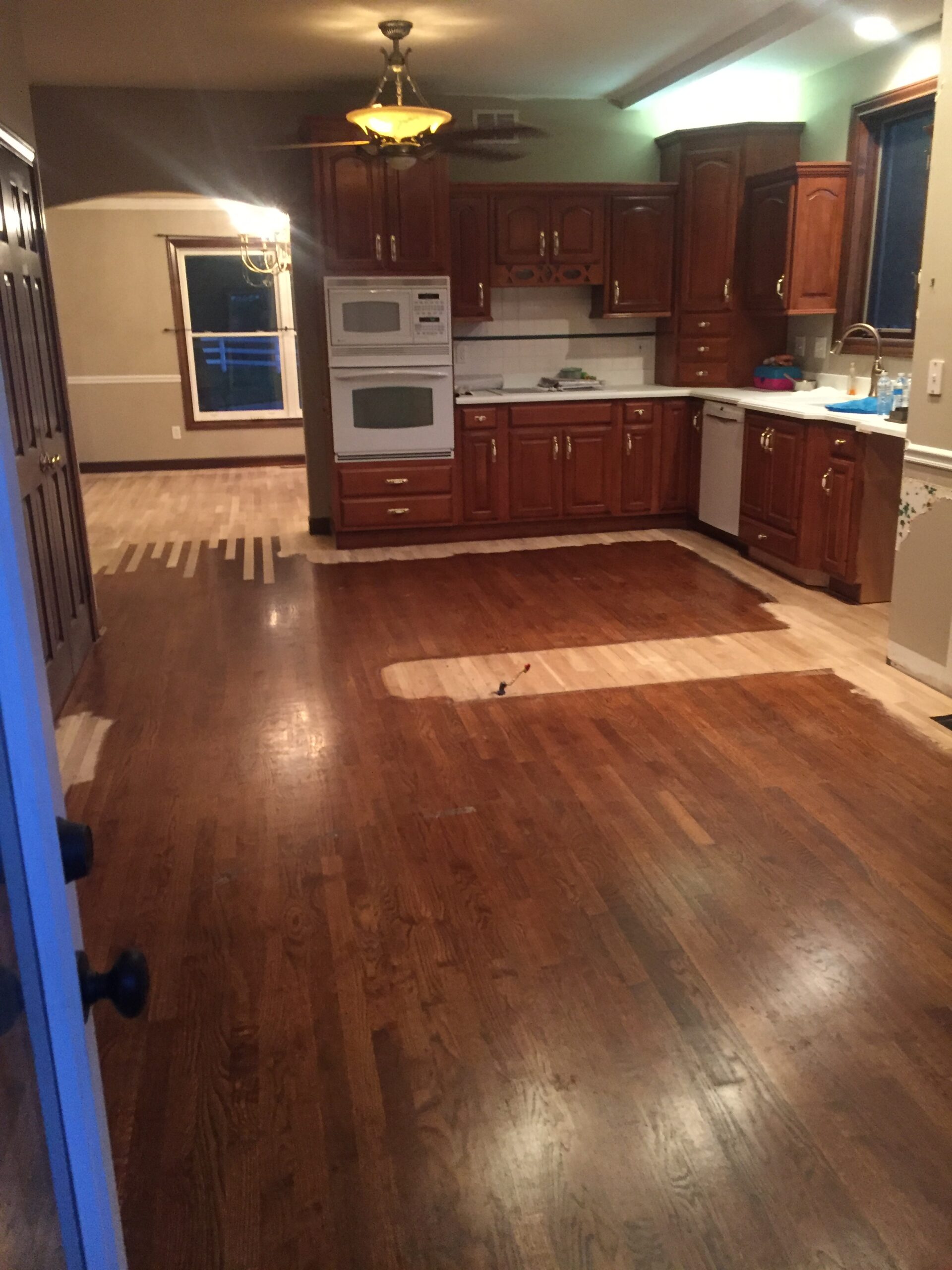 Kitchen and hardwood floors before restoration work
